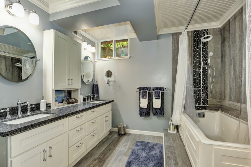 Contemporary bathroom with dual vanities